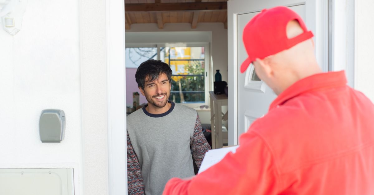 locksmith unlocking front door — Rapid Keys Locksmith
